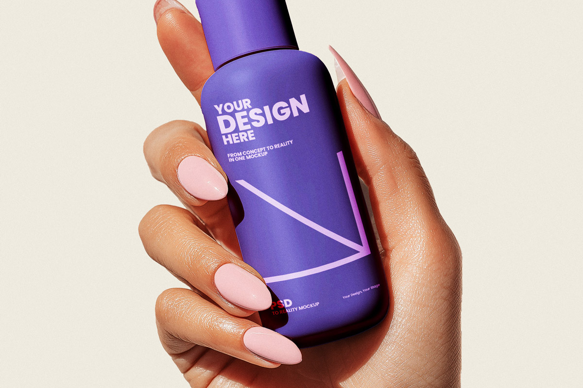 Free Cosmetic Bottle in Woman Hand Mockup