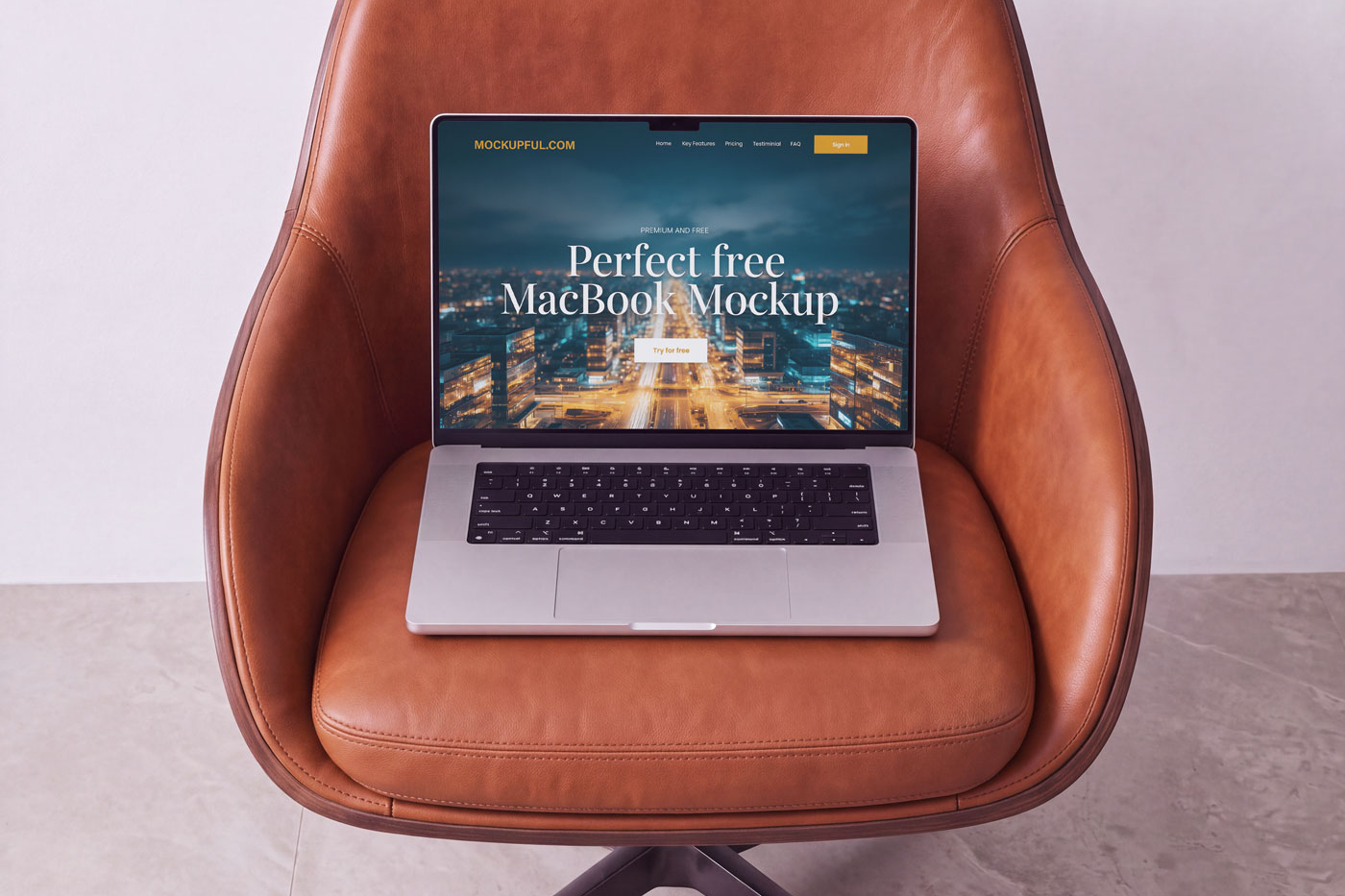 Free MacBook on Chair Mockup